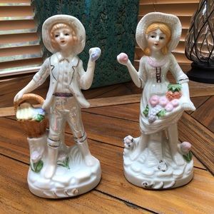 Vintage porcelain boy and girl gardening. No name.